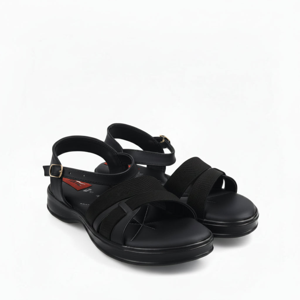 A pair of black athletic sandals with textured mesh straps and adjustable ankle buckles, photographed on a white studio background.