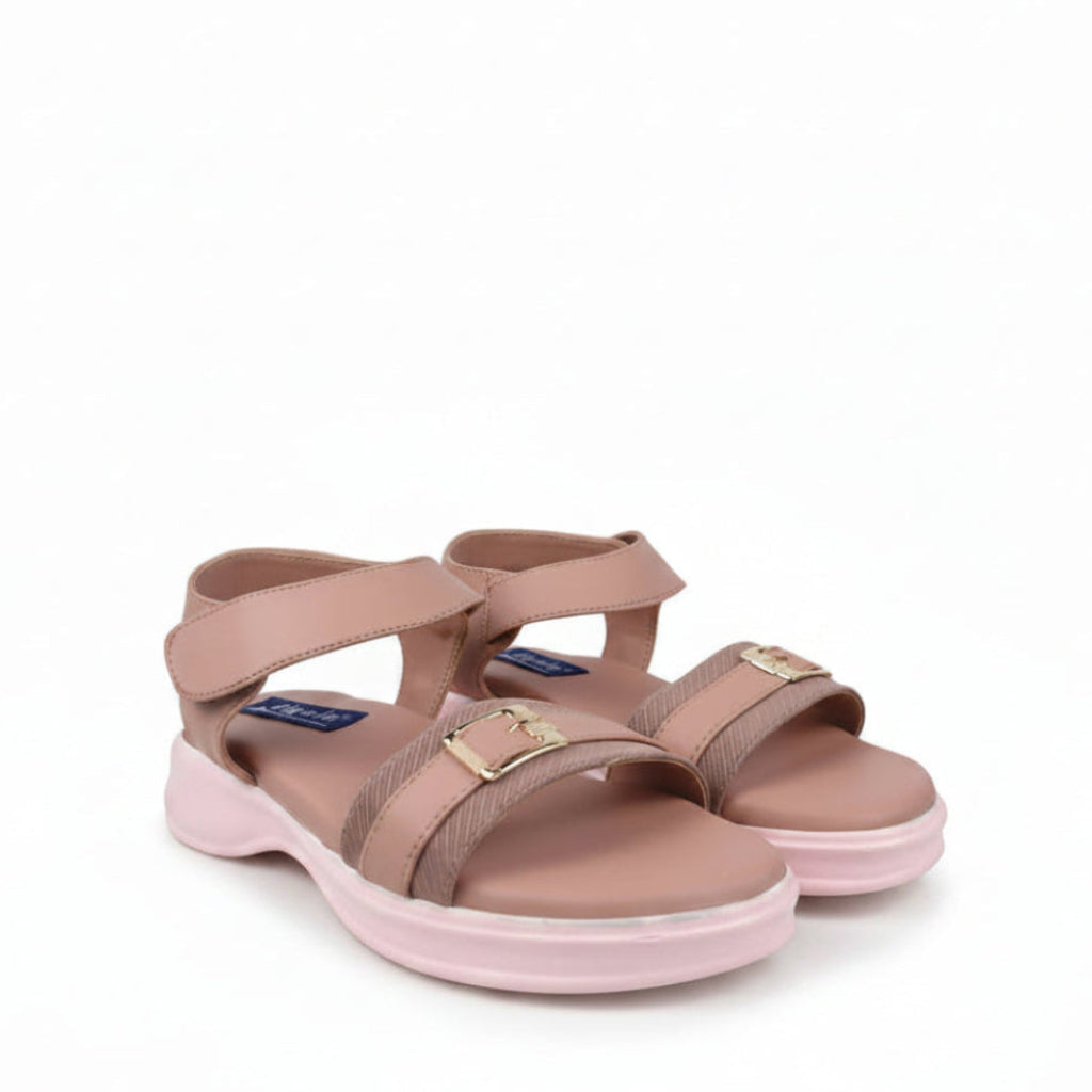 A pair of women's platform sandals in a dusty rose pink color, featuring double straps with gold-tone buckles and a blue brand label on the side, set against a light gray background.