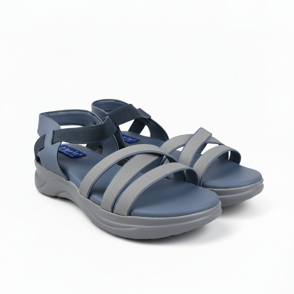 A pair of gray and slate blue wedge sandals with double textured straps, shown on a white studio background.
