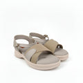 A pair of women's platform sandals in beige and light tan, featuring textured woven straps and adjustable ankle straps with gold-tone buckles, shown on a light gray background.