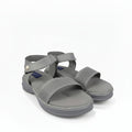 A pair of gray comfort sandals with perforated straps and adjustable ankle straps, shown on a light gray background.