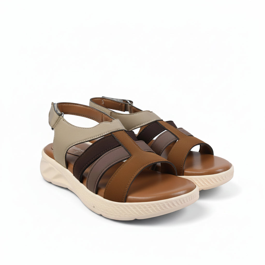 A pair of women's platform sandals in brown, beige, and dark brown, featuring a chunky cream-colored sole and adjustable ankle straps.
