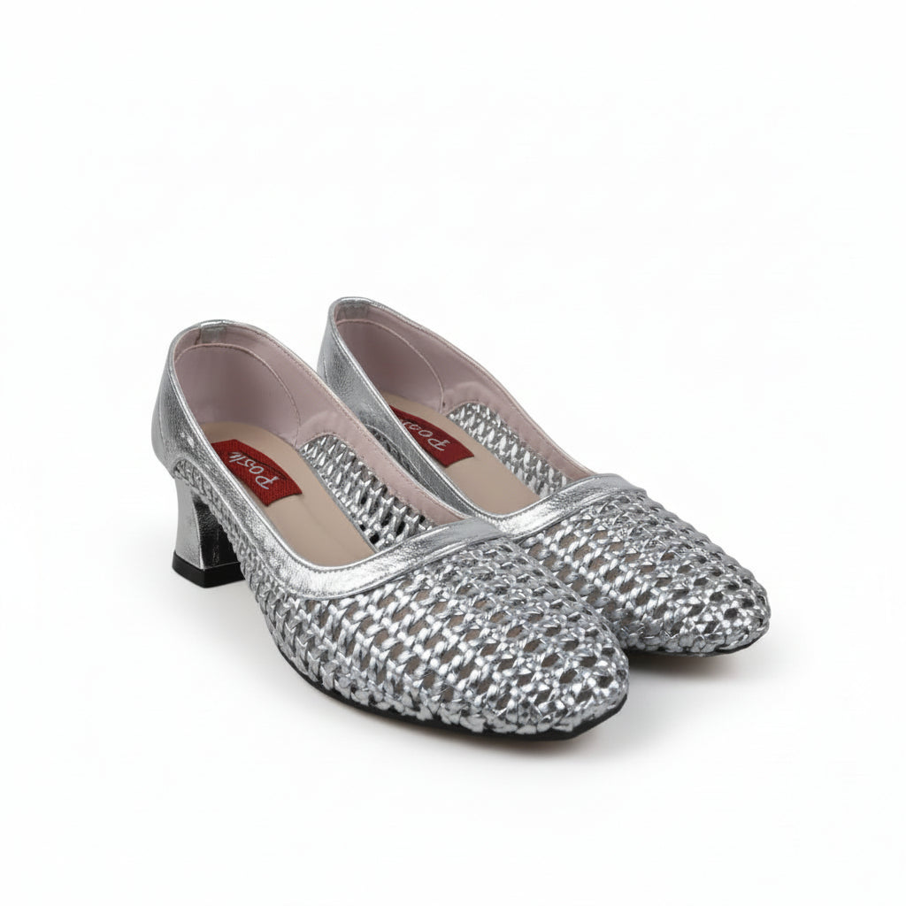 A pair of women's silver high-heeled pumps covered in rhinestones, displayed on a white studio background.