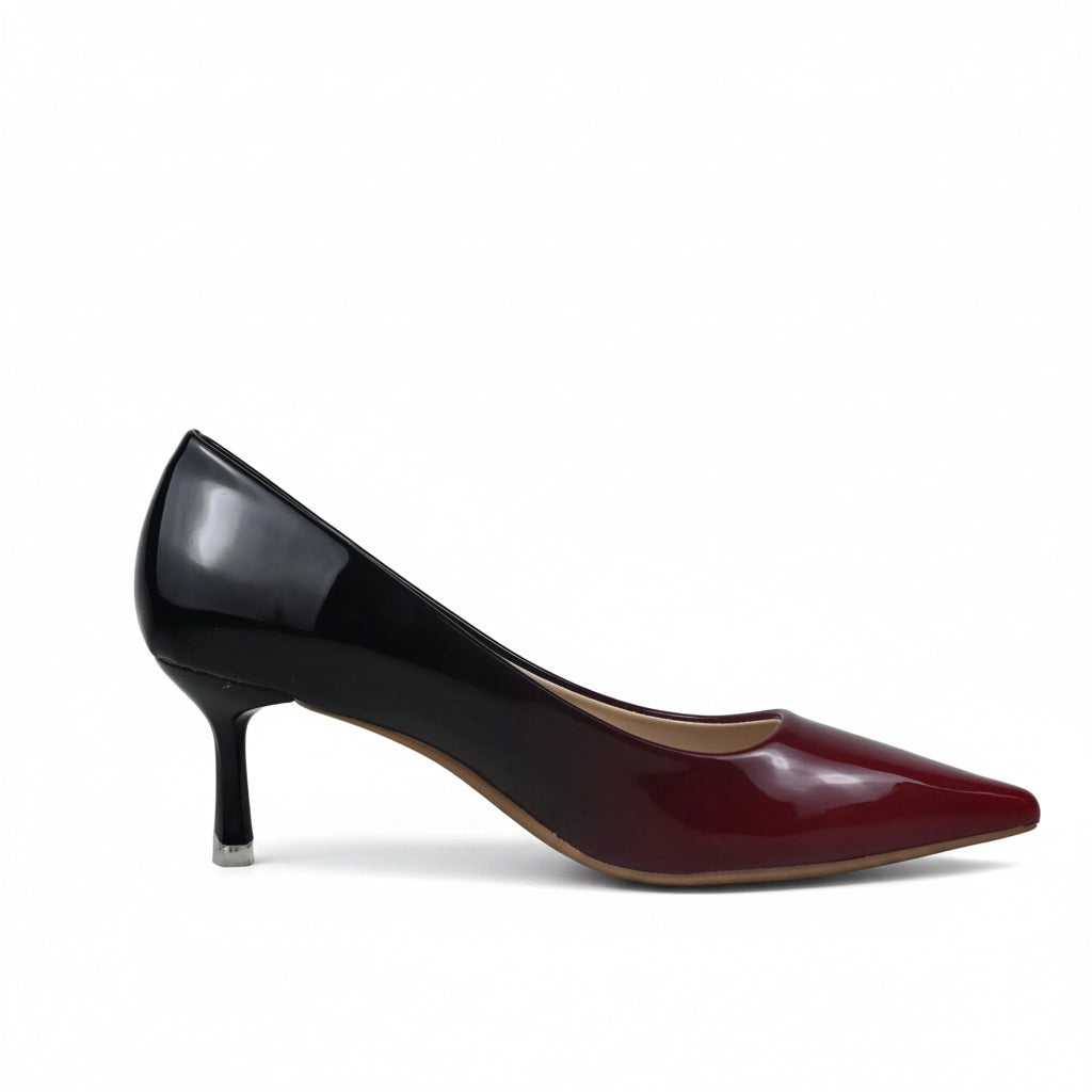 A single women's pointed-toe kitten heel pump in a glossy black-to-deep-red ombre finish, shown from the side against a plain light gray studio background.