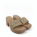 A pair of women's platform mule sandals in tan, featuring a block heel and double straps embellished with gold-tone studs and a central horizontal band of multicolored rhinestones, shown on a white studio background.