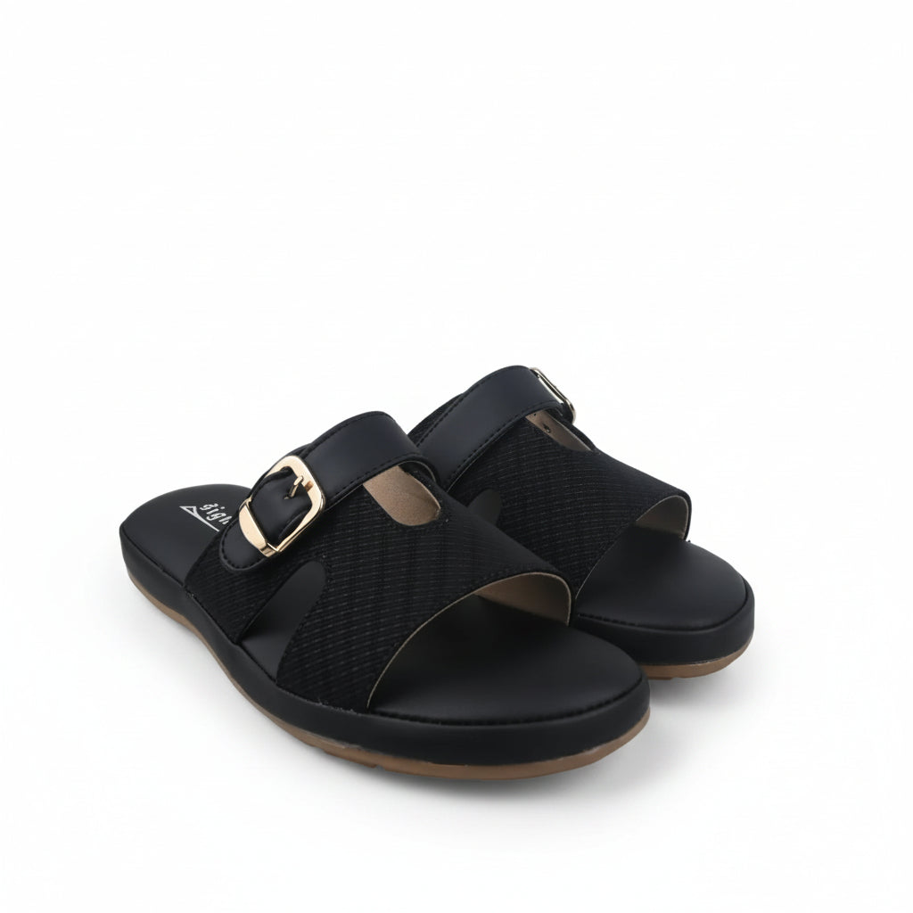 A pair of black slide sandals with textured straps and gold-tone buckle details, photographed on a white studio background.