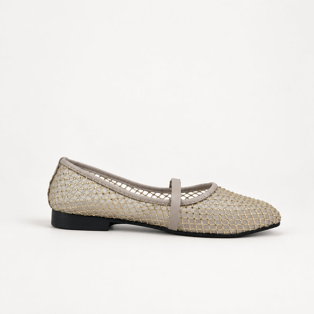 A single women's flat shoe with a woven beige upper and a thin beige strap across the instep, shown against a light gray backdrop. A partial black brand tag is visible on the right edge.