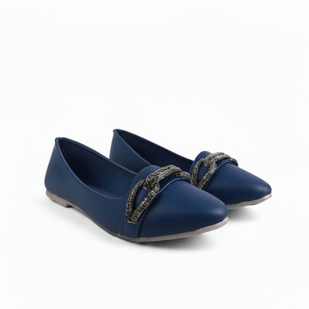 A pair of navy blue leather ballet flats with a decorative silver-tone chain embellishment across the toe, shown on a plain white background.
