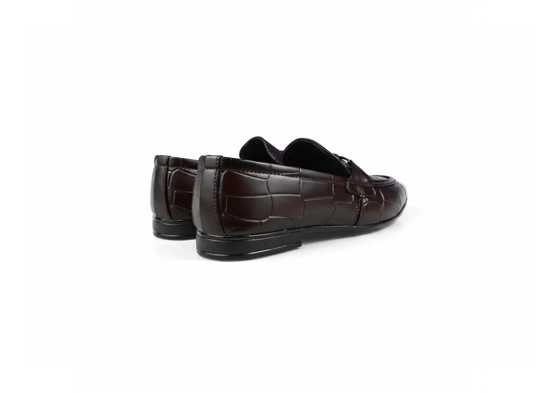 A pair of dark brown  loafers with a crocodile-embossed pattern on the toe and side, displayed on a clean white background.