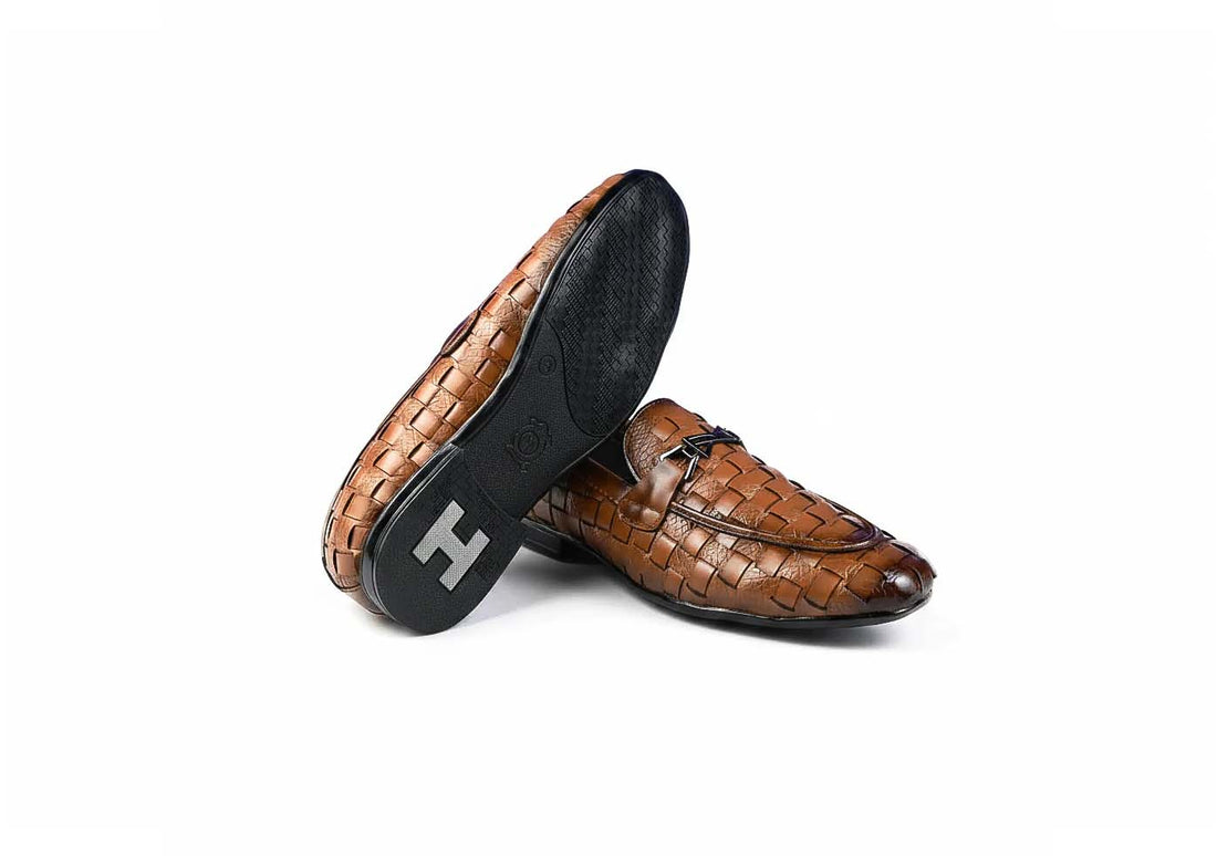 A pair of dark brown woven loafers with a glossy finish, displayed on a clean white background.
