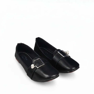 A pair of black leather flat shoes with square toes and silver buckle embellishments, displayed on a clean white background.