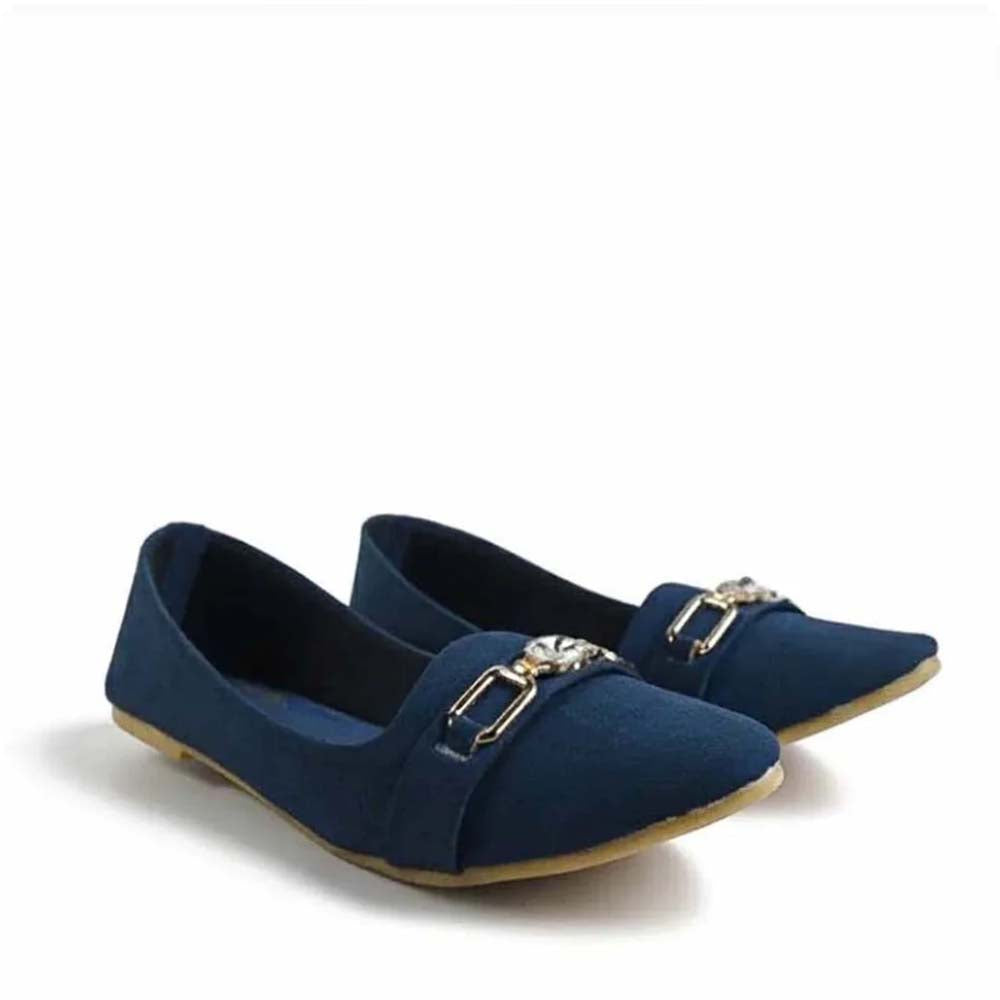 A pair of navy blue flat shoes with a pointed toe and a decorative gold-tone buckle embellishment on the vamp, shown against a plain white background.