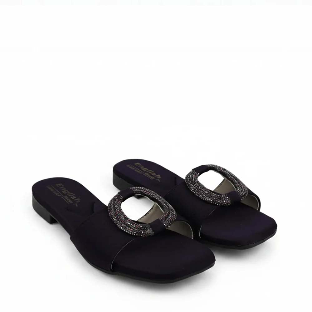 A pair of women's open-toe slide sandals in dark navy blue satin, featuring a square toe and a decorative oval buckle embellished with sparkling rhinestones. The brand name 'Fashions' is printed on the insole.