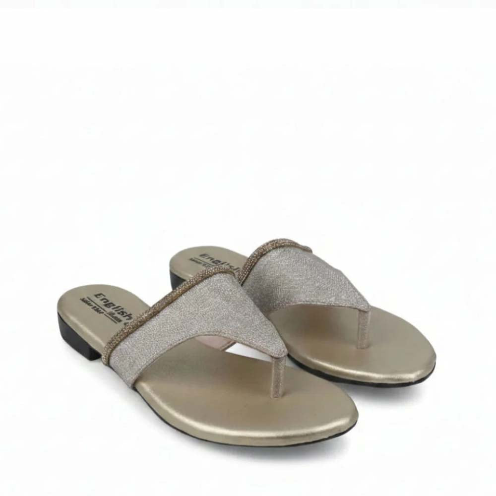 A pair of metallic gold slide sandals with glittery silver straps, shown on a plain white background.