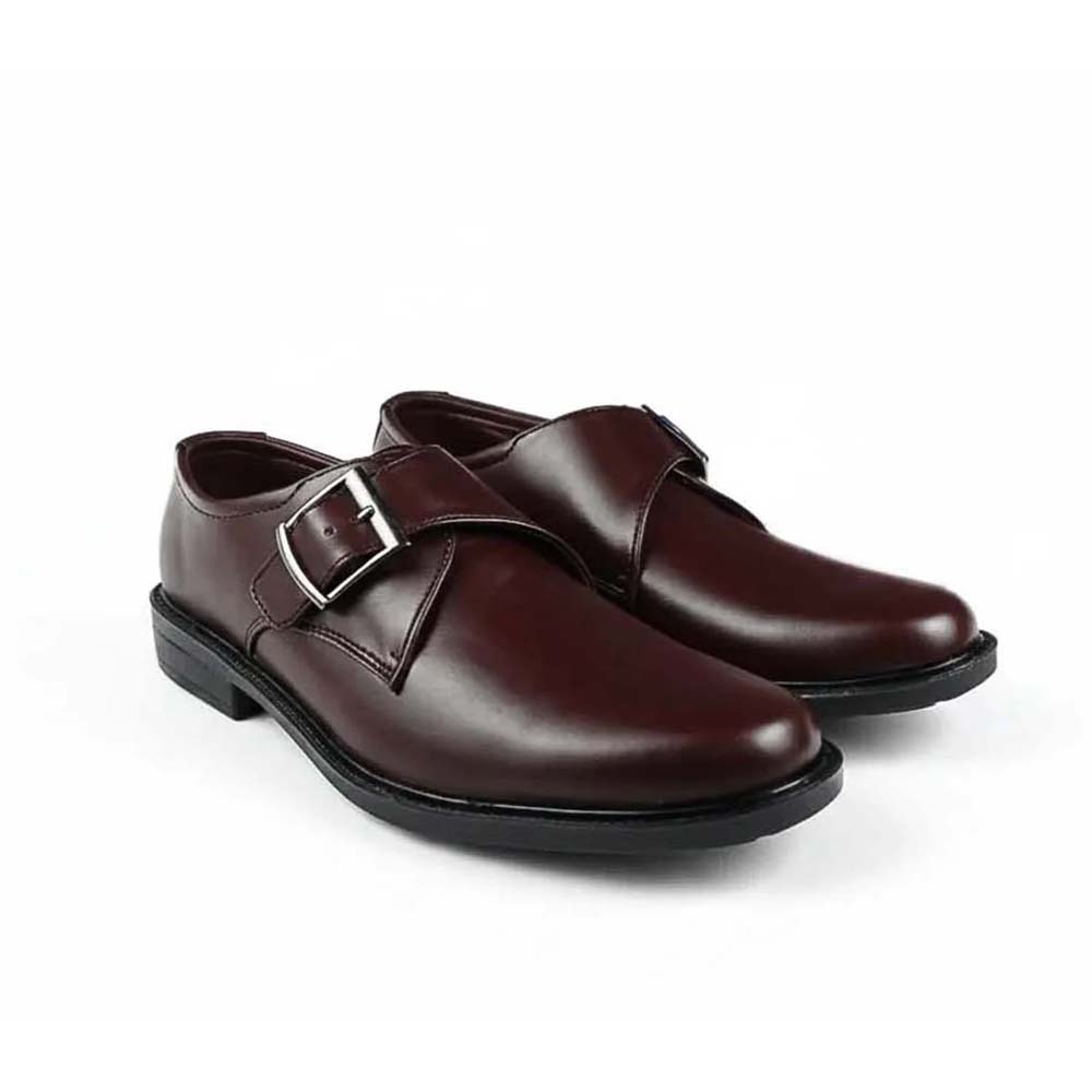 A pair of men's dark burgundy leather double monk strap shoes with silver buckle details, shown on a plain white background.