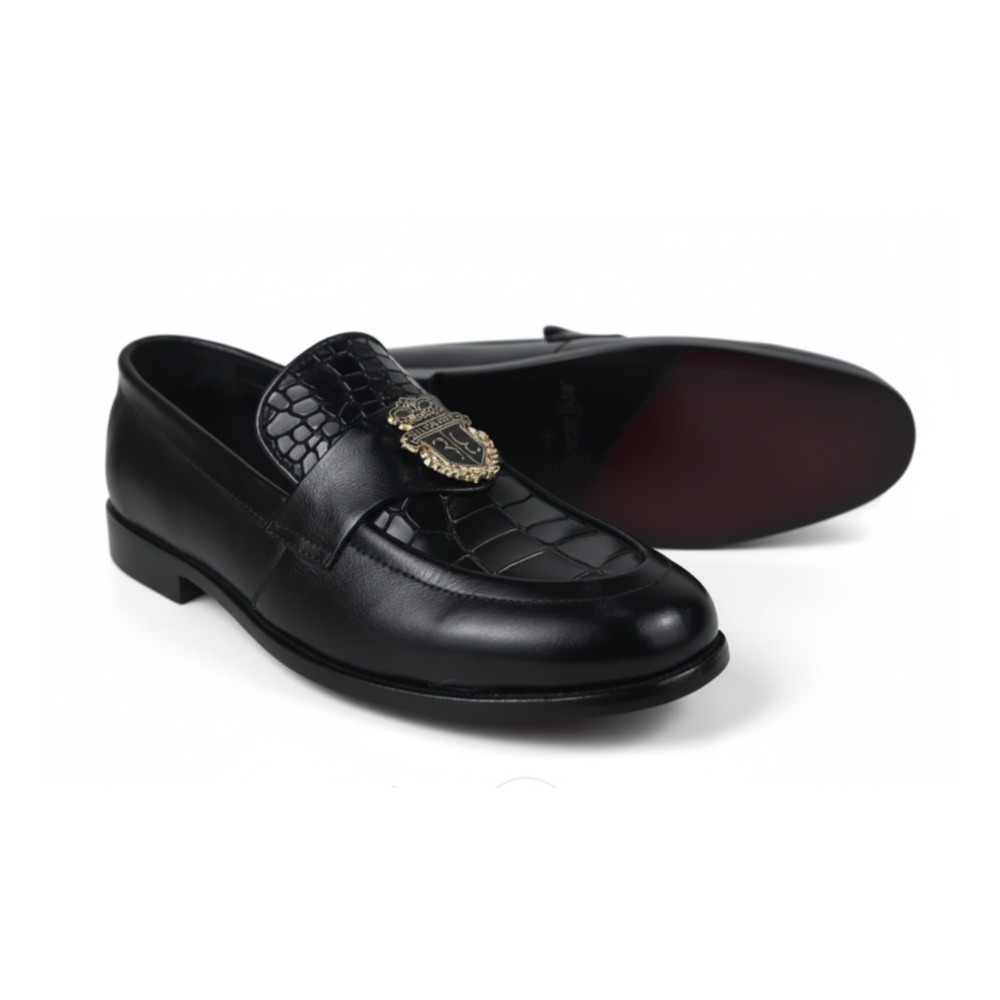 Pair of brown  loafers with decorative emblem on a white background